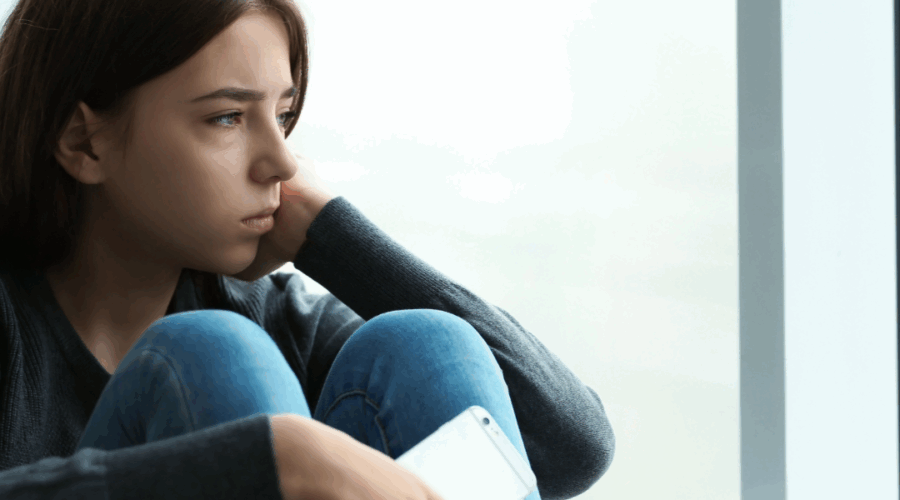 Young woman struggling with people pleasing, Empowered girl breaking free from people pleasing, teen girl mental health, teen girl thinking, young woman sad, teen anxiety, student stressyoung woman therapy session, teen with counselor, therapy support